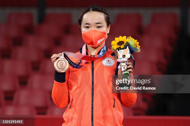 Ito Mima of Team Japan poses for photographs during the medal ceremony of the Women's Singles table tennis on day six of the Tokyo 2020 Olympic Games...