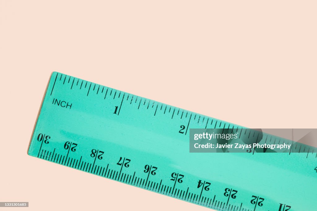 Green Ruler On Pastel Background