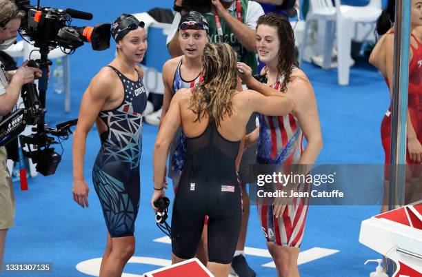 Silver Medalists Paige Madden, Katie Ledecky, Katie McLaughlin and Allison Schmitt of Team USA during the 4 x 200m Freestyle Relay final on day six...