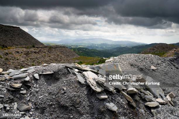 Mountains of slate create the landscape near the disused Maenofferen Slate Quarry on July 29, 2021 in Blaenau Ffestiniog, United Kingdom. The North...