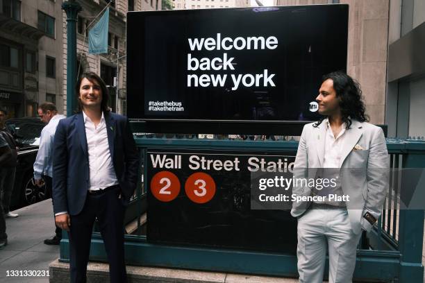 Baiju Bhatt and Vlad Tenev, founders of the online brokerage Robinhood, walk along Wall Street after going public with an IPO earlier in the day on...