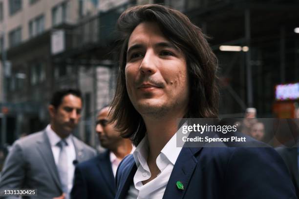 Vlad Tenev, CEO of the online brokerage Robinhood, walks along Wall Street after going public with an IPO earlier in the day on July 29, 2021 in New...