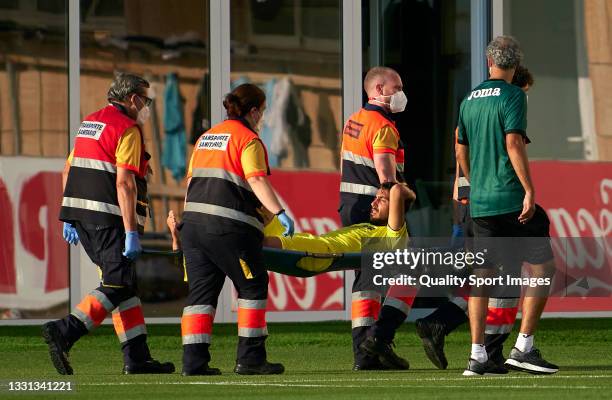 Daniel Parejo of Villarreal leaves the pitch with an injury during a pre-season friendly match between Villarreal CF and Levante UD at Villarreal...