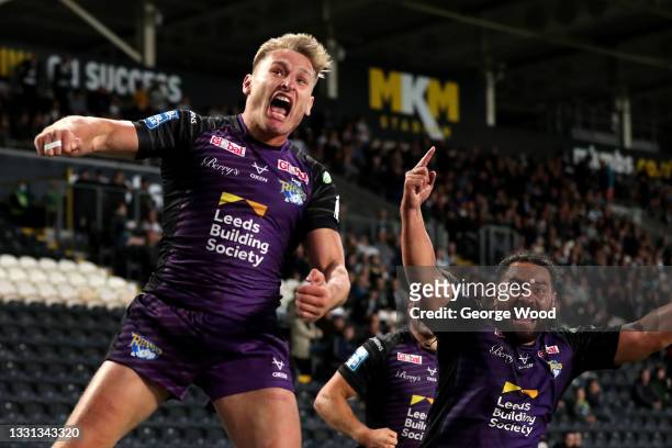 Brad Dwyer of Leeds Rhinos celebrates after scoring their side's first try during the Betfred Super League match between Hull FC and Leeds Rhinos at...
