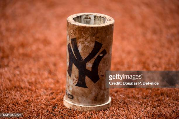 Detailed view of a New York Yankees baseball doughnut during the second inning against the Tampa Bay Rays at Tropicana Field on July 27, 2021 in St...