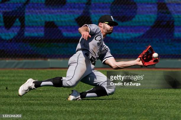 Adam Engel of the Chicago White Sox catches a ball hit by Hunter Dozier of the Kansas City Royals in the seventh inning at Kauffman Stadium on July...