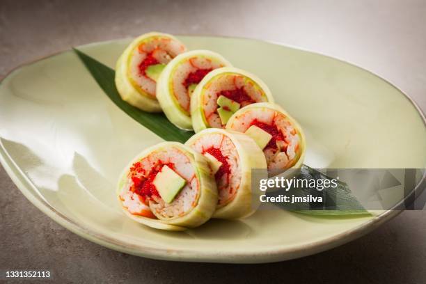 zucchini wraps on a plate - peruvian culture imagens e fotografias de stock