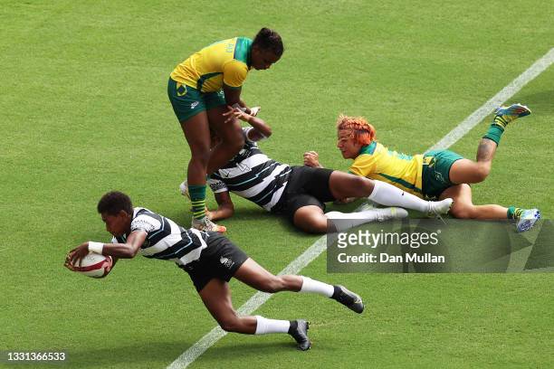 Reapi Ulunisau of Team Fiji scores a try in the Women’s pool B match between Team Fiji and Team Brazil during the Rugby Sevens on day seven of the...