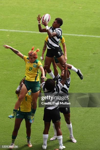 Reapi Ulunisau of Team Fiji jumps at the lineout under pressure from Luiza Campos of Team Brazil in the Women’s pool B match between Team Fiji and...