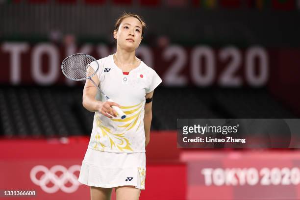 Nozomi Okuhara of Team Japan reacts as she competes against He Bing Jiao of Team China during a Women's Singles Quarterfinal match on day seven of...