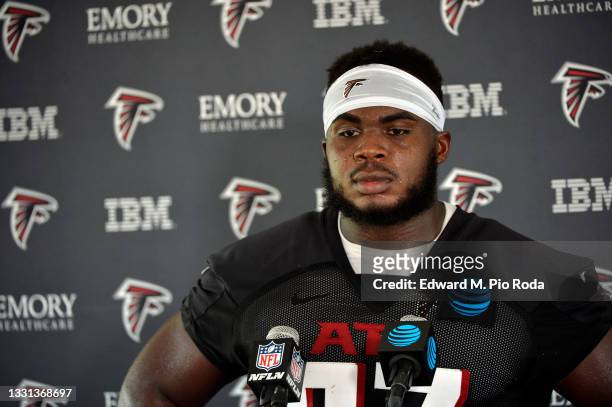 Grady Jarrett of the Atlanta Falcons talks to reporters during training camp at IBM Performance Field on July 29, 2021 in Flowery Branch, Georgia.