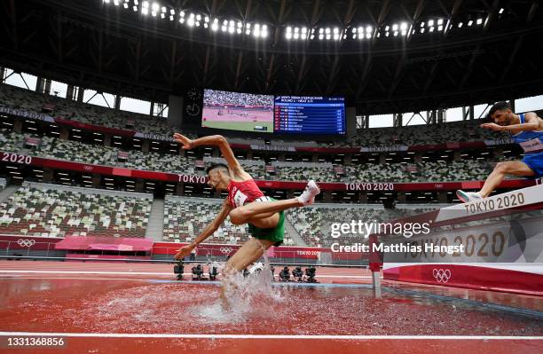 Mohamed Tindouft of Team Morocco competes during round one of the Men's 3000m Steeplechase heats on day seven of the Tokyo 2020 Olympic Games at...