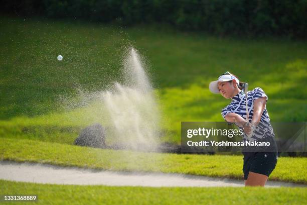 Erika Hara of Japan hits out from a bunker on the 13th hole during the second round of Rakuten Super Ladies at Tokyu Grand Oak Golf Club on July 30,...