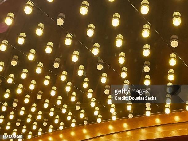 glamorous show lights at a theater - cabaret stock pictures, royalty-free photos & images