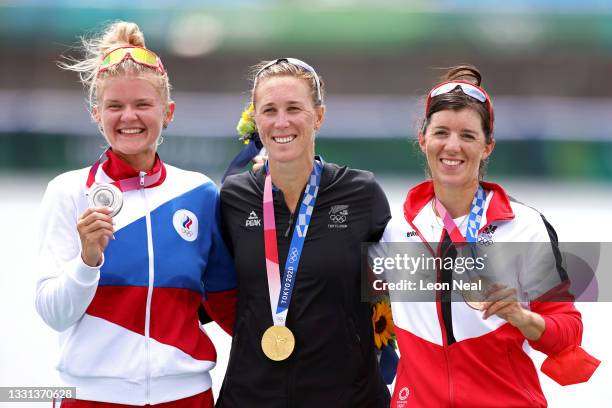 Silver medalist Hanna Prakatsen of Team ROC, gold medalist Emma Twigg of Team New Zealand and bronze medalist Magdalena Lobnig of Team Austria pose...