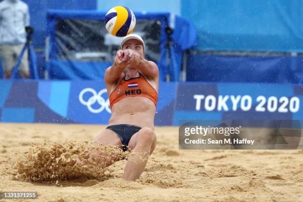 Madelein Meppelink of Team Netherlands returns against Team United States during the Women's Preliminary - Pool B beach volleyball on day seven of...