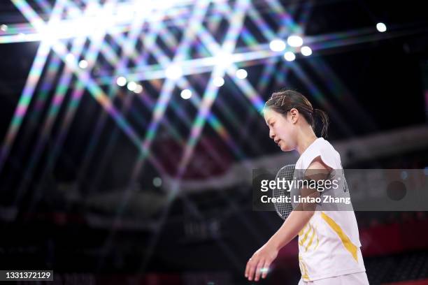 Nozomi Okuhara of Team Japan reacts as she competes against He Bing Jiao of Team China during a Women's Singles Quarterfinal match on day seven of...