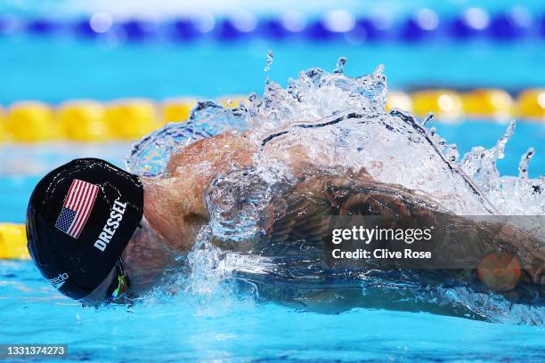 Caeleb Dressel of Team United States competes in the second Semifinal of the Men's 100m Butterfly on day seven of the Tokyo 2020 Olympic Games at...