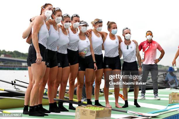 Team New Zealand poses after winning the silver medal during the Women's Eight Final A on day seven of the Tokyo 2020 Olympic Games at Sea Forest...