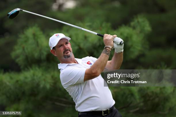 Rory Sabbatini of Team Slovakia plays his shot from the 12th tee during the second round of the Men's Individual Stroke Play on day seven of the...