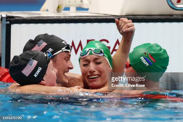Tatjana Schoenmaker of Team South Africa is congratulated by Lilly King of Team United States, Annie Lazor of Team United States and Kaylene Corbett...