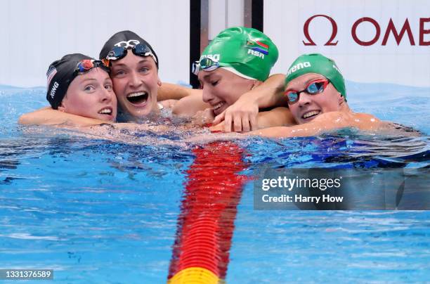 Tatjana Schoenmaker of Team South Africa is congratulated by Lilly King of Team United States , Annie Lazor of Team United States and Kaylene Corbett...