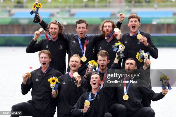 Gold medalists Team New Zealand pose with their medals during the Men's Eight Final A on day seven of the Tokyo 2020 Olympic Games at Sea Forest...