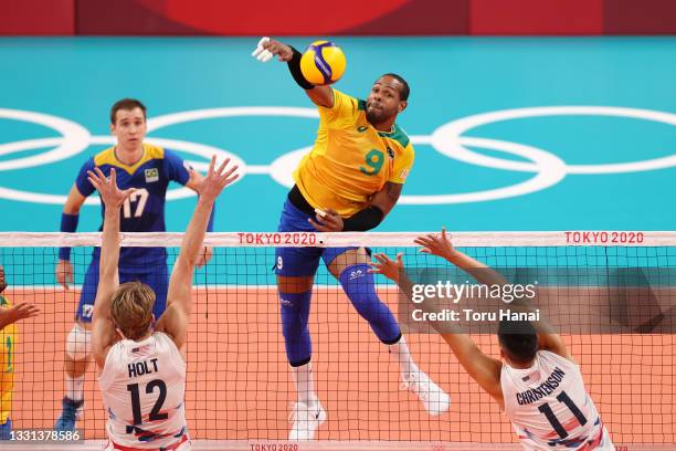 Yoandy Leal Hidalgo of Team Brazil strikes against Team United States during the Men's Preliminary Round - Pool B volleyball on day seven of the...