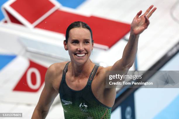 Emma McKeon of Team Australia reacts after winning a gold medal and breaking the olympic record in the Women's 100m Freestyle Final on day seven of...