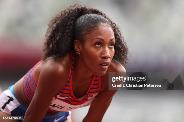 Ajee Wilson of Team United States reacts after competing during round one of the Women's 800m heats on day seven of the Tokyo 2020 Olympic Games at...