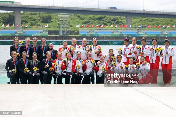 Silver medalists Team New Zealand, gold medalists Team Canada and bronze medalists Team China pose with their medals during the medal ceremony for...