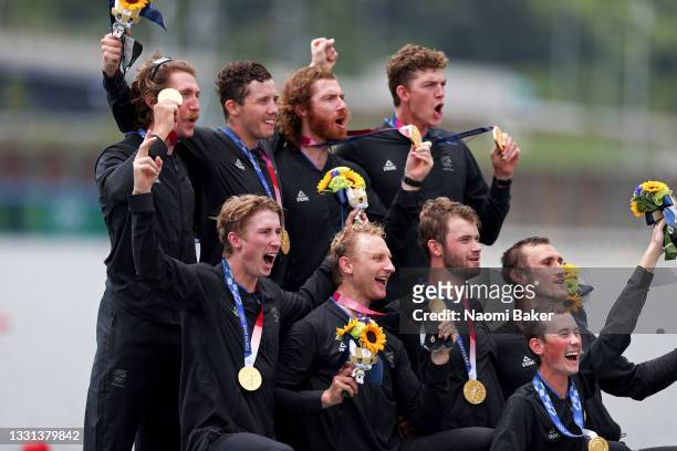 Gold medalists Team New Zealand pose with their medals during the Men's Eight Final A on day seven of the Tokyo 2020 Olympic Games at Sea Forest...