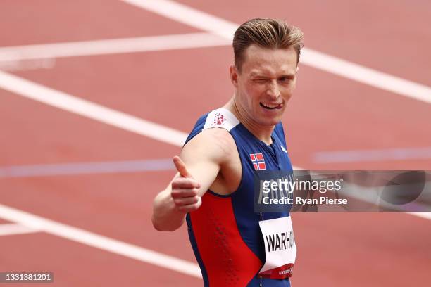 Karsten Warholm of Team Norway reacts after competing during round one of the Men's 400m hurdles heats on day seven of the Tokyo 2020 Olympic Games...