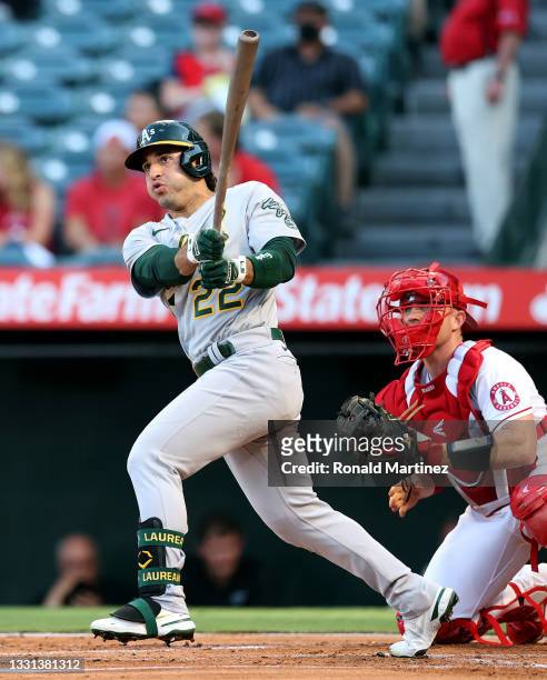 Ramon Laureano of the Oakland Athletics hits a double against the Los Angeles Angels in the first inning at Angel Stadium of Anaheim on July 29, 2021...