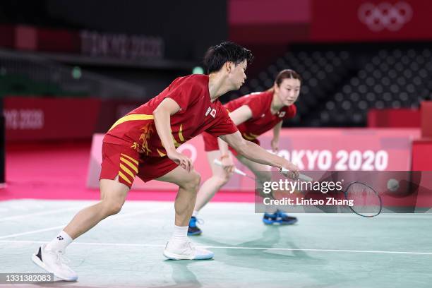 Yuta Watanabe and Arisa Higashino of Team Japan compete against Tang Chun Man and Tse Ying Suet of Team Hong Kong China during the Mix Doubles Bronze...