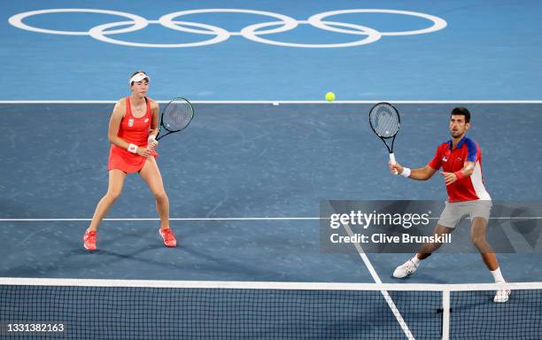 Novak Djokovic of Team Serbia and Nina Stojanovic of Team Croatia play Kevin Krawietz of Team Germany and Laura Siegemund of Team Germany during...