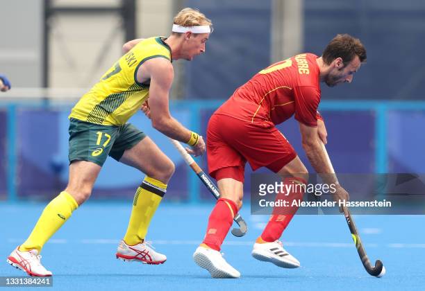 Aran Zalewski of Team Australia defends against David Alegre Biosca of Team Spain during the Men's Preliminary Pool A match between Australia and...