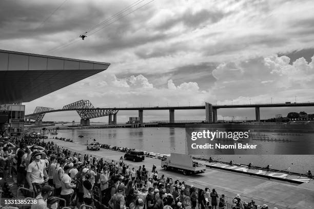 People watch as athletes compete during the Men's Eight Final A on day seven of the Tokyo 2020 Olympic Games at Sea Forest Waterway on July 30, 2021...