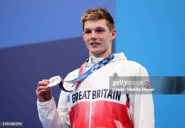 Silver medalist Duncan Scott of Team Great Britain celebrates during the medal ceremony for the Men's 200m Individual Medley Final on day seven of...