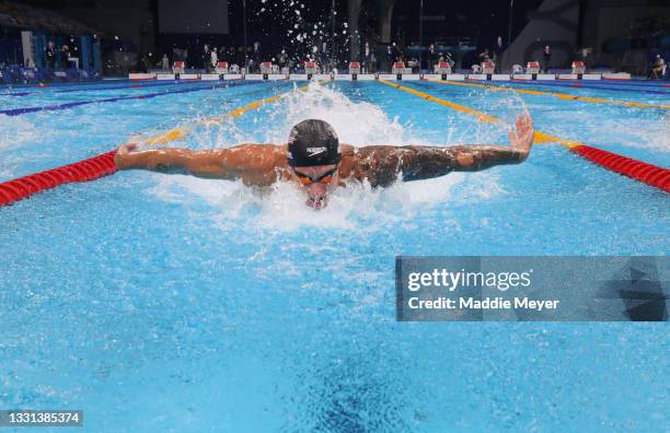 Caeleb Dressel of Team United States competes in the second Semifinal of the Men's 100m Butterfly on day seven of the Tokyo 2020 Olympic Games at...