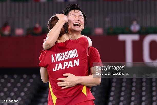 Yuta Watanabe and Arisa Higashino of Team Japan celebrate after winning against Tang Chun Man and Tse Ying Suet of Team Hong Kong China during the...