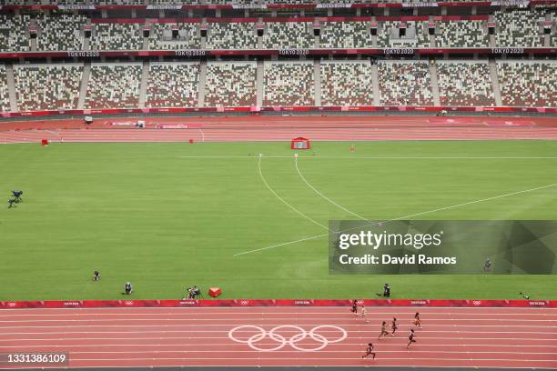 Athletes compete during round one of the Women's 100m heats on day seven of the Tokyo 2020 Olympic Games at Olympic Stadium on July 30, 2021 in...