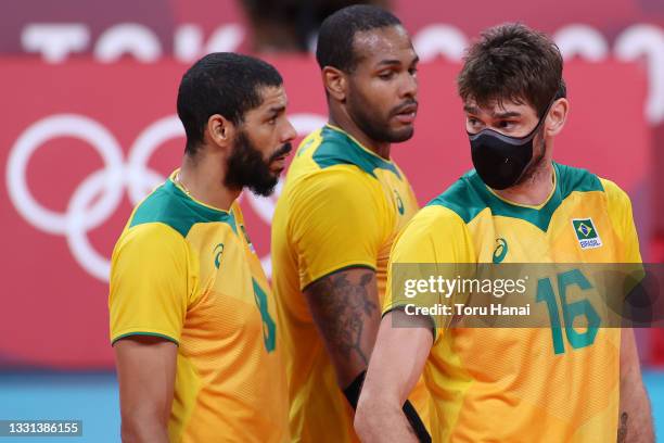 Lucas Saatkamp of Team Brazil reacts while wearing a mask against Team United States during the Men's Preliminary Round - Pool B volleyball on day...