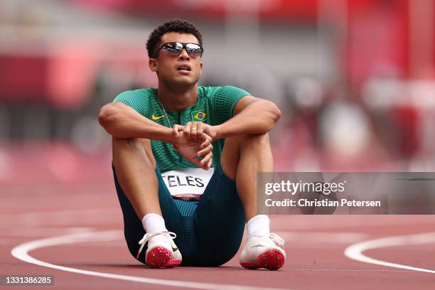 Marcio Teles of Team Brazil reacts after competing during round one of the Men's 400m hurdles heats on day seven of the Tokyo 2020 Olympic Games at...