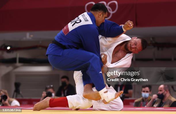 Javad Mahjoub of Refugee Olympic Team and Lukas Krpalek of Team Czech Republic compete during the Men’s Judo +100kg Elimination Round of 16 on day...