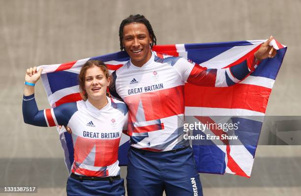 Gold medalist Bethany Shriever of Team Great Britain and silver medalist Kye Whyte of Team Great Britain celebrate while holding the flag of they...