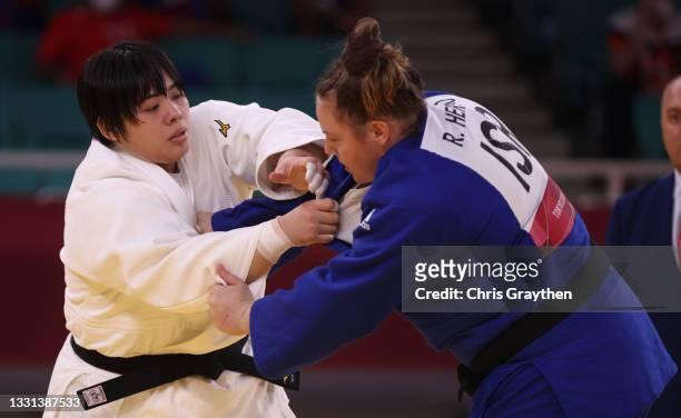 Akira Sone of Team Japan and Raz Hershko of Team Israel compete during the Women’s Judo +78kg Quarterfinal on day seven of the Tokyo 2020 Olympic...