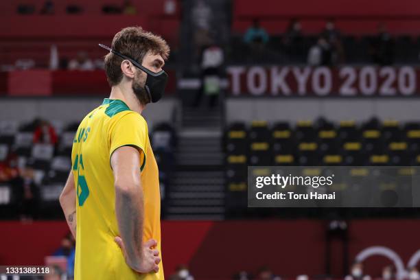 Lucas Saatkamp of Team Brazil looks on while wearing a face mask against Team United States during the Men's Preliminary Round - Pool B volleyball on...