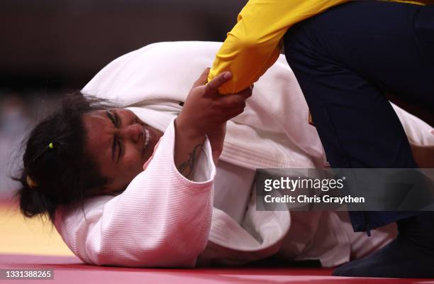 Maria Suelen Altheman of Team Brazil is injured during the Women’s Judo +78kg Quarterfinal match against Romane Dicko of Team France on day seven of...
