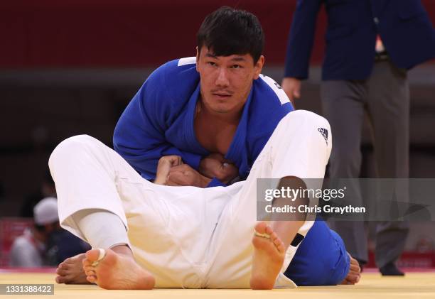 Henk Grol of Team Netherlands and Bekmurod Oltiboev of Team Uzbekistan compete during the Men’s Judo +100kg Elimination Round of 16 on day seven of...